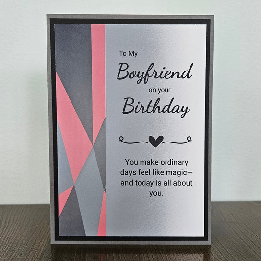 Front of a handmade A2 romantic birthday card for boyfriend featuring a bold red geometric heart with layered cardstock borders and text reading Happy Birthday to My Boyfriend.