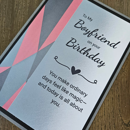 Front of a handmade A2 romantic birthday card for boyfriend featuring a bold red geometric heart with layered cardstock borders and text reading Happy Birthday to My Boyfriend.