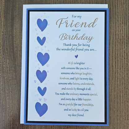 Front of a handmade 5x7 birthday card for friend featuring a vertical row of watercolor purple hearts framed in black and purple with a detailed birthday poem.