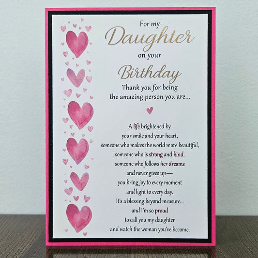 Front and inside view of a handmade 5x7 birthday card for daughter featuring pink watercolor hearts, bold black and hot pink borders, and printed sentimental verses.