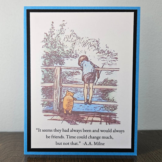 A square greeting card featuring a Winnie the Pooh illustration of Pooh and Tigger looking at water, with a quote from A.A.