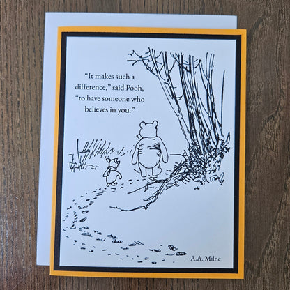 Front of a handmade A2 Winnie the Pooh friendship card featuring classic Pooh and Piglet walking together with the quote It makes such a difference to have someone who believes in you.