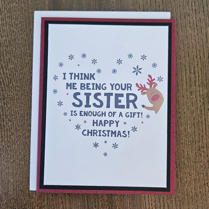 Funny sister Christmas card shown with its coordinating white envelope