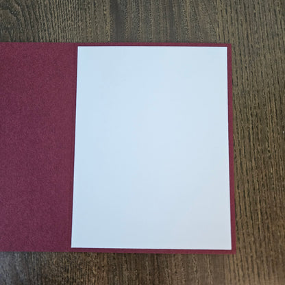 Blank interior of handmade A2 sister Christmas greeting card for a personal message