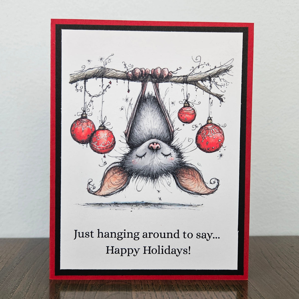  Handmade holiday bat card with red Christmas ornaments and Just hanging around to say Happy Holidays greeting