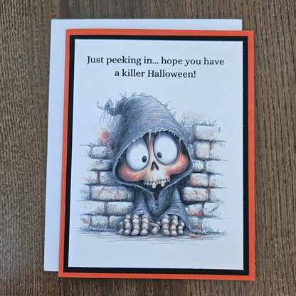 Handmade funny Halloween card with peeking grim reaper skeleton and killer sentiment