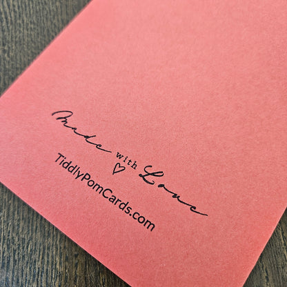 Coral handmade card back with Made with Love and TiddlyPomCards.com branding