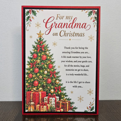 Handmade Grandma Christmas card with a decorated tree, gifts and a printed poem on a white card front.