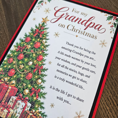 Angled close-up of the handmade Grandpa Christmas card front and its holiday design.