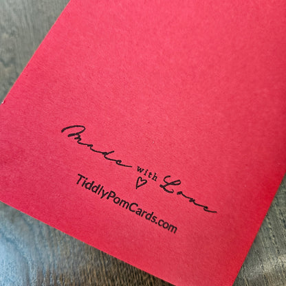 Red back of the handmade gothic birthday card stamped Made with Love and TiddlyPomCards.com.