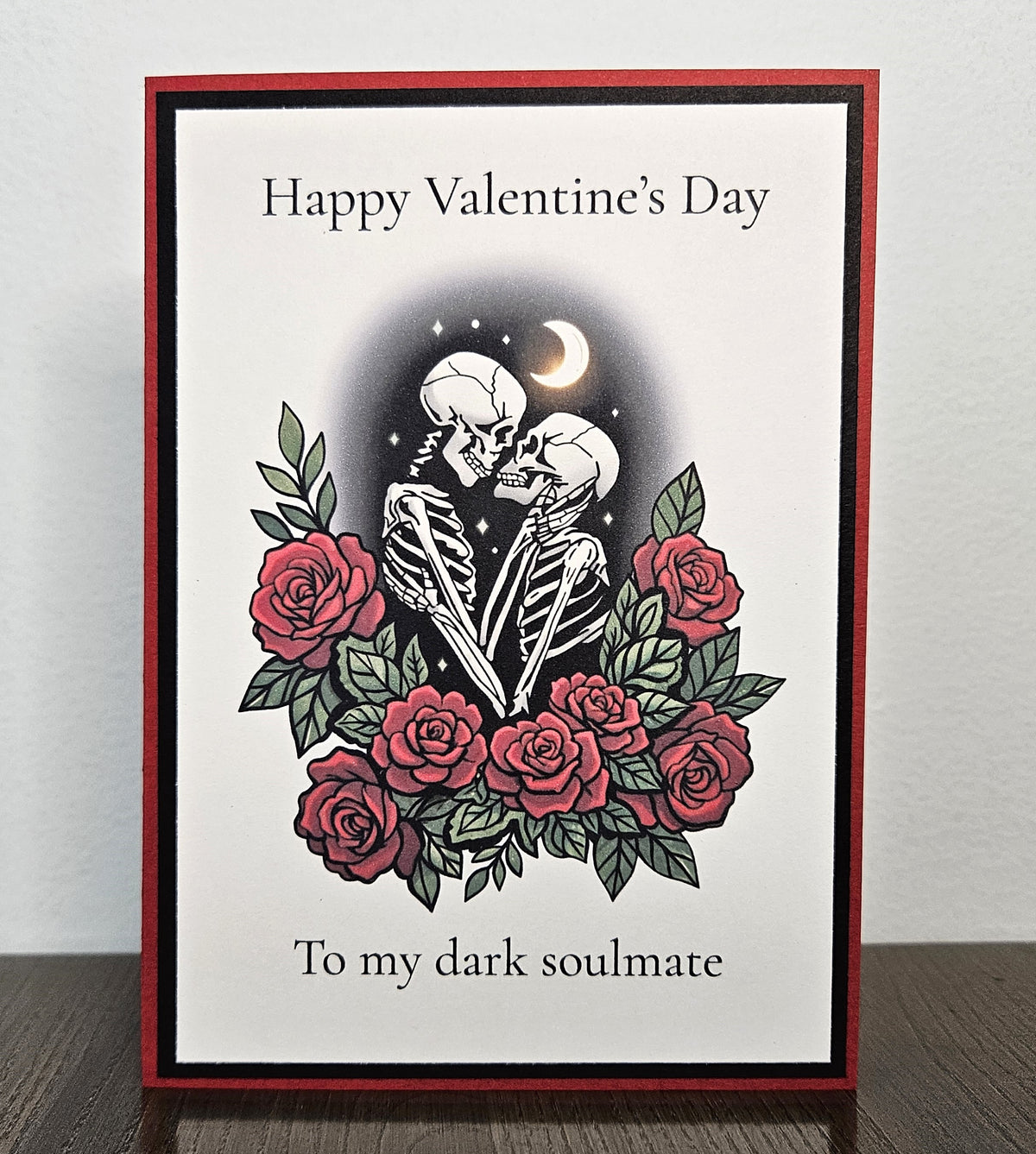 Handmade gothic Valentine's Day card with an embracing skeleton couple, roses and moon, reading Happy Valentine's Day, To my dark soulmate.