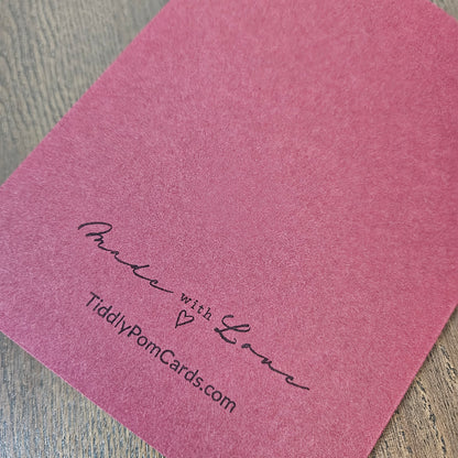 Burgundy back of the handmade Grim Reaper Christmas card stamped Made with Love and TiddlyPomCards.com.