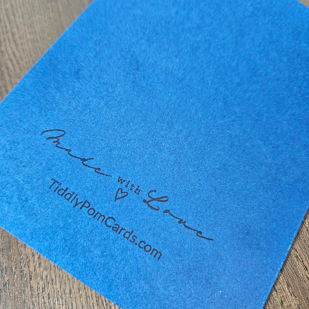 Blue back of handmade nativity Christmas card stamped Made with Love and TiddlyPomCards.com