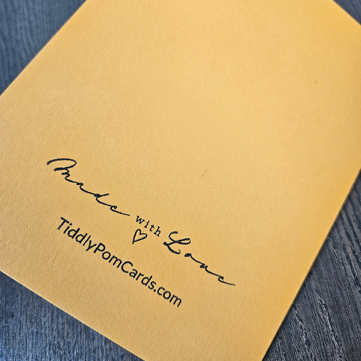 Yellow back of the handmade greeting card stamped Made with Love and TiddlyPomCards.com.