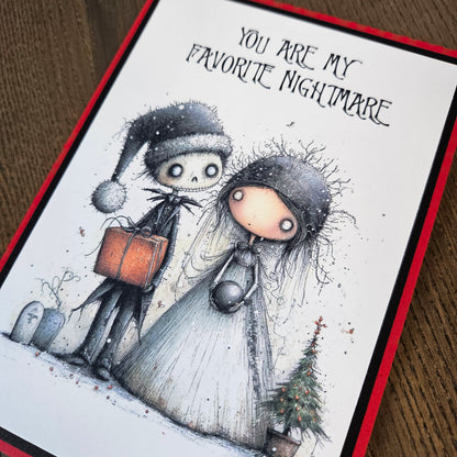 Angled close-up of the spooky couple illustration and layered borders on a handmade Favorite Nightmare Christmas card.
