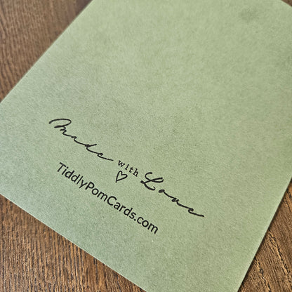 Sage green card back stamped Made with Love and TiddlyPomCards.com.