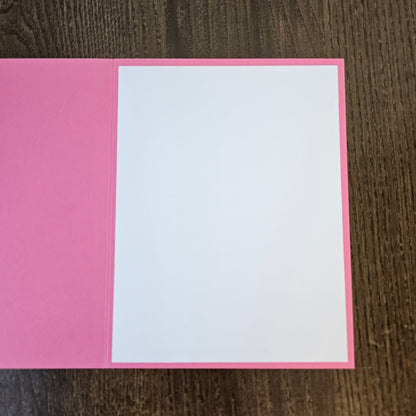 Open pink appreciation card showing its blank white interior writing panel.