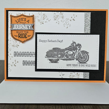 Handmade Father's Day biker card with Life's a Journey shield emblem, stamped motorcycle, orange and black layered cardstock, 5x7 horizontal keepsake