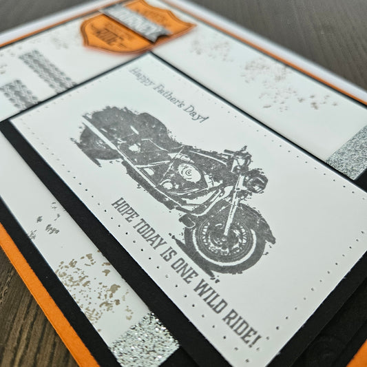 Front of Father's Day motorcycle card showing Happy Father's Day Hope Today Is One Wild Ride sentiment and silver foil accent stripe