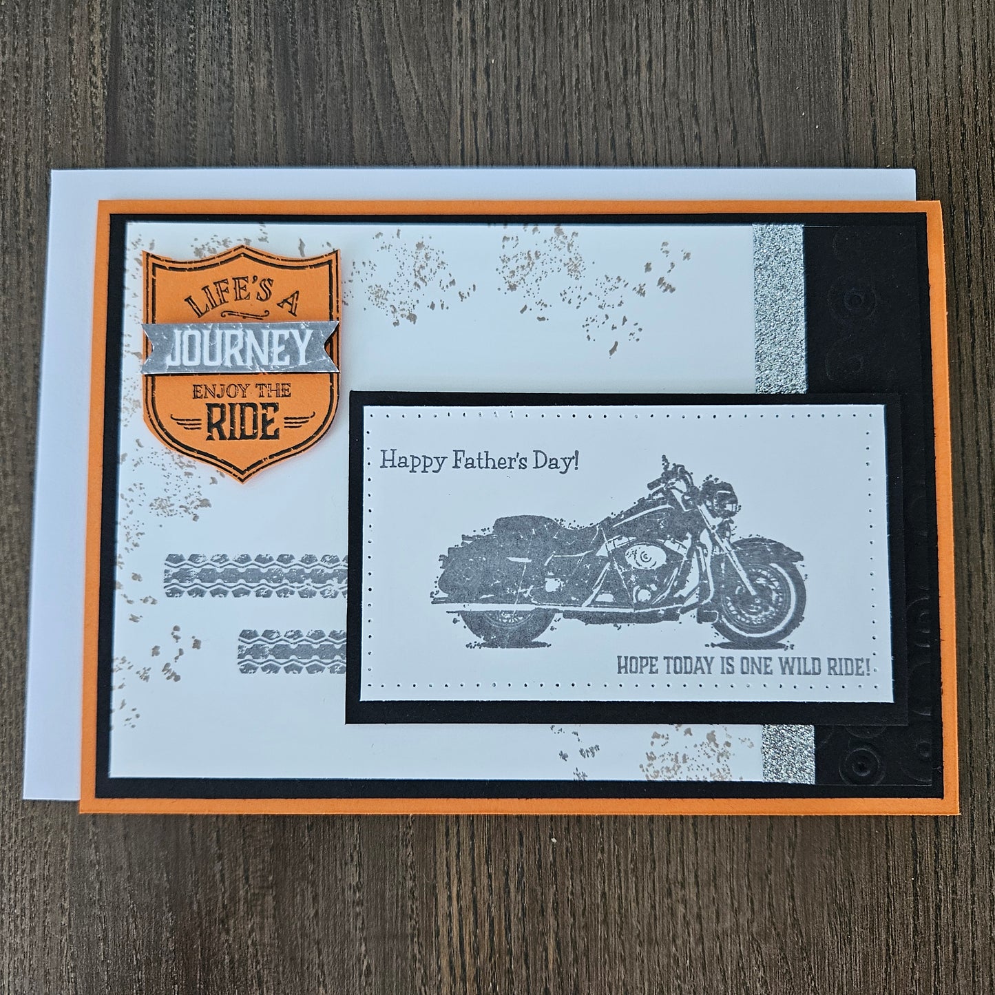 Full view of handmade Father's Day motorcycle card showing 5x7 horizontal orientation on orange and black layered cardstock